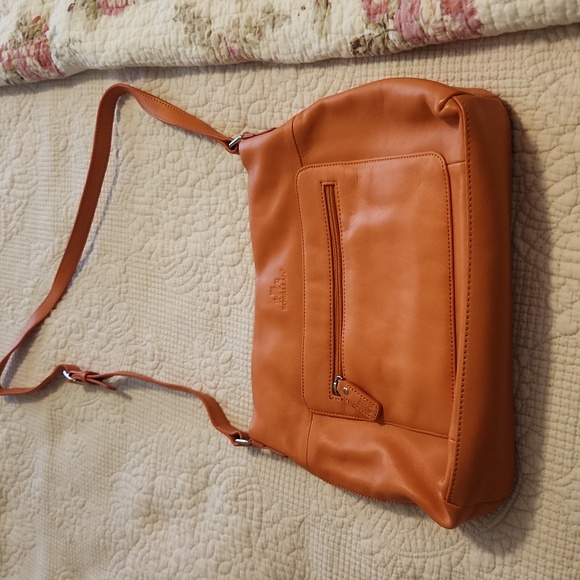 Rowallan Orange leather cross body bag. - Picture 1 of 3